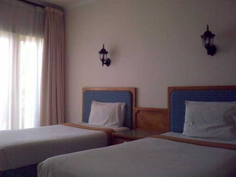 Pasific Beach Cottages Mangsit Exterior photo