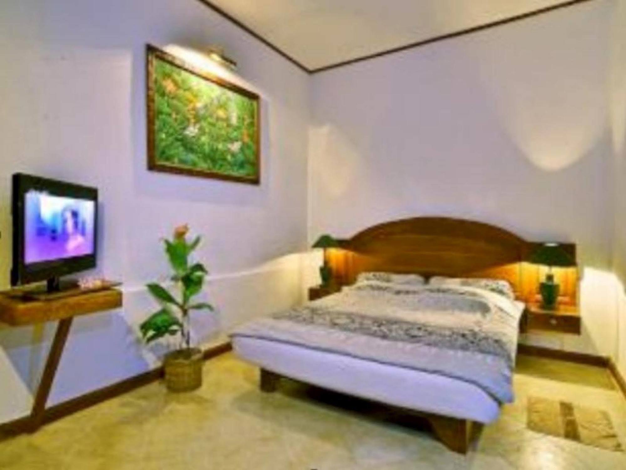 Pasific Beach Cottages Mangsit Exterior photo